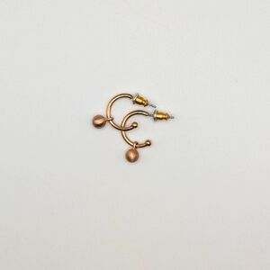 COS rose gold coloured earrings